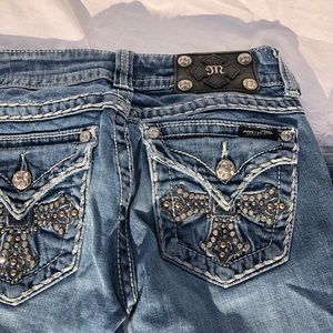 Miss Me Bootcut Jeans w/ Cross Pocket Metal Detail